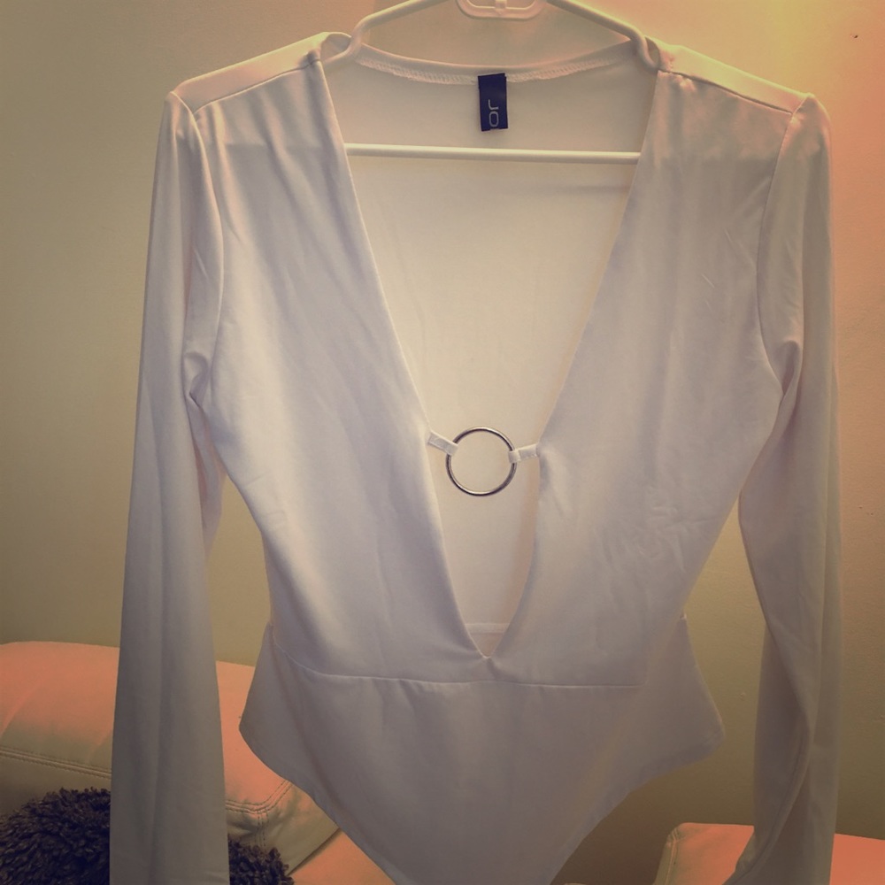 White, plunging neckline bodysuit